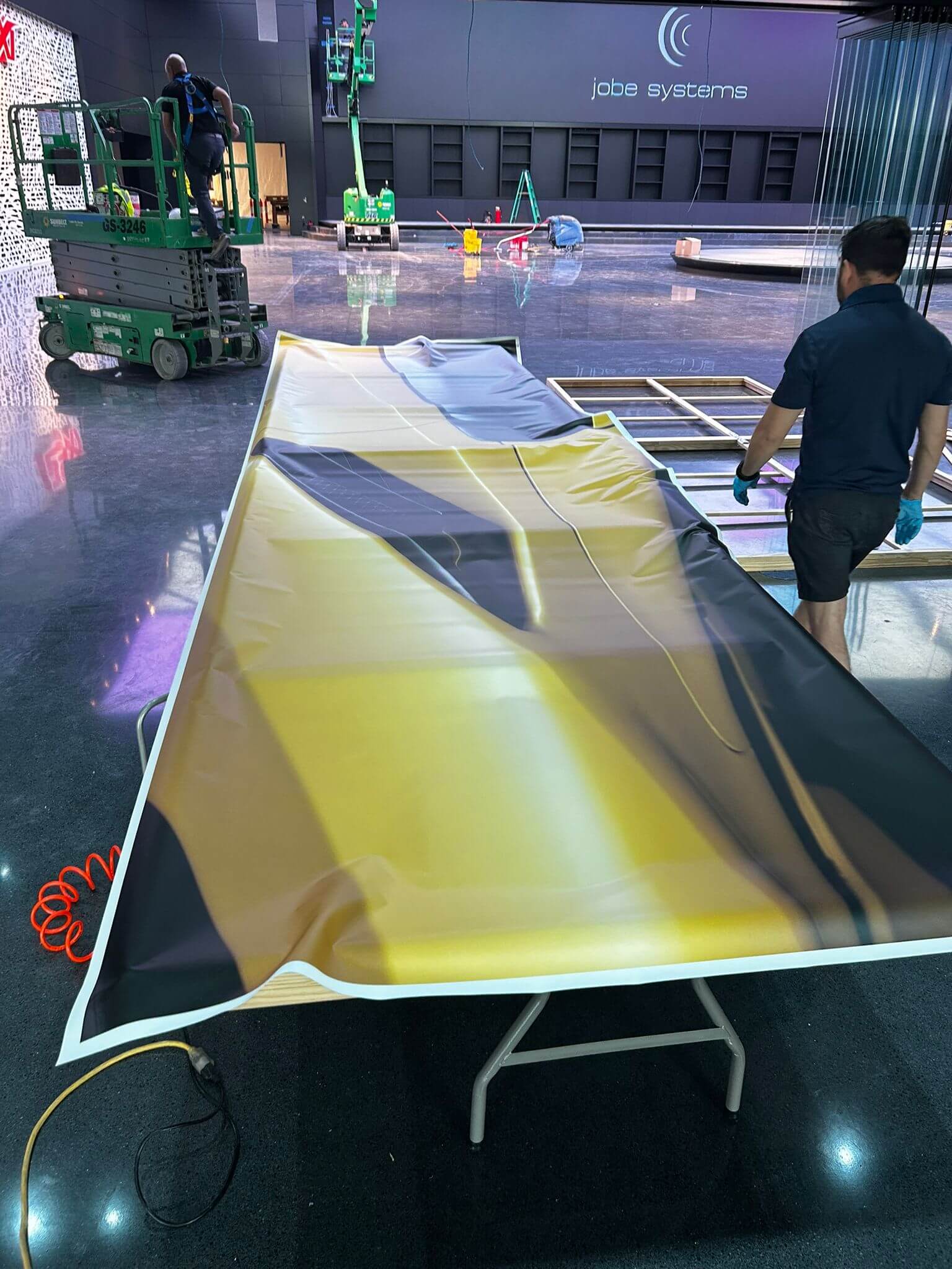 Custom-stretched canvas displayed in a collector’s car gallery in Miami